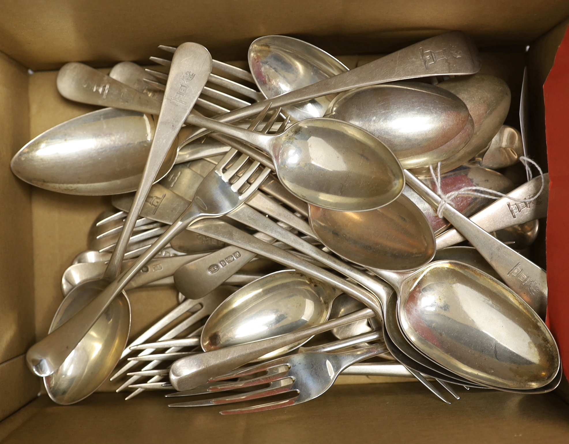 A set of nine Edwardian silver Old English pattern dessert spoons by John Round, Sheffield, 1907 and thirty other assorted items of silver flatware including Old English pattern and Hanovarian pattern, various dates and